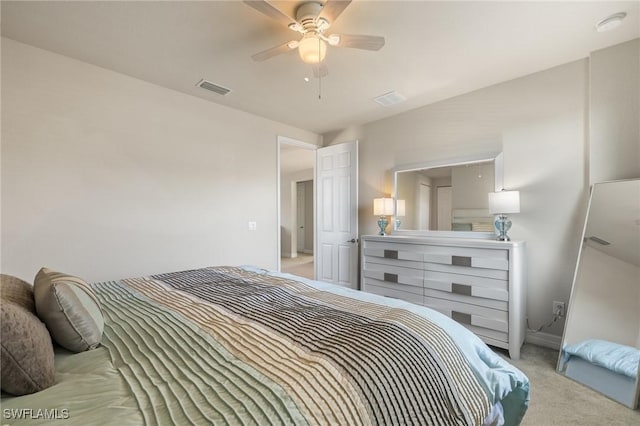 bedroom featuring light carpet and ceiling fan