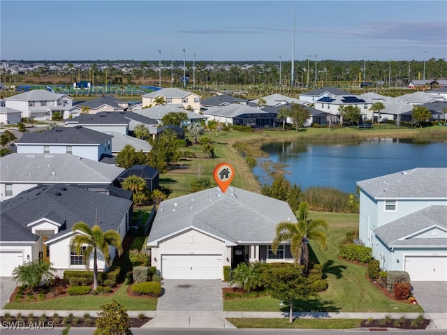 bird's eye view with a water view