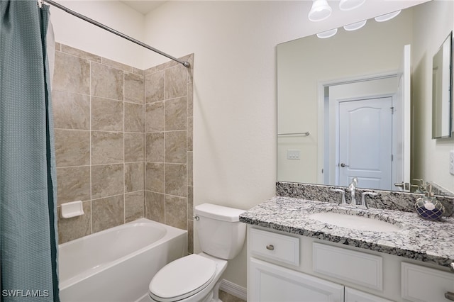 full bathroom featuring vanity, shower / bath combination with curtain, and toilet