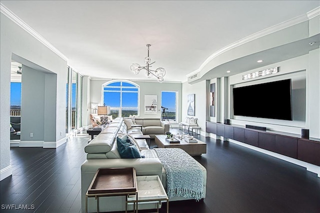 living room with crown molding, an inviting chandelier, and dark wood-type flooring