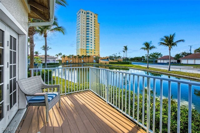 balcony featuring a water view