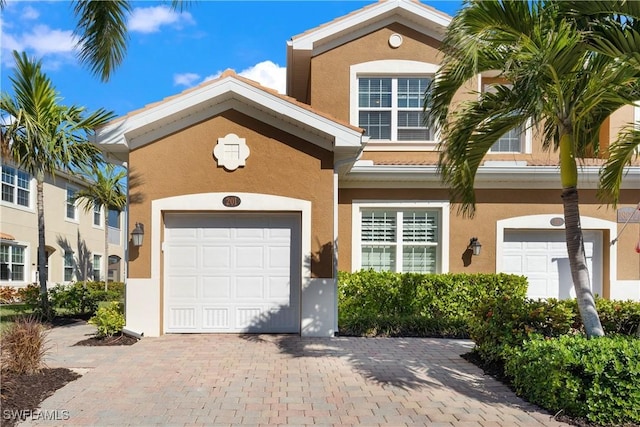 view of front of house with a garage