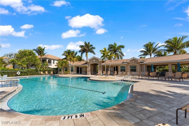 view of swimming pool featuring a patio