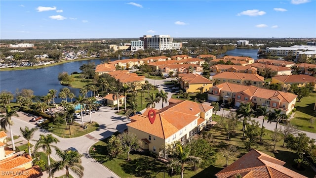 drone / aerial view with a water view