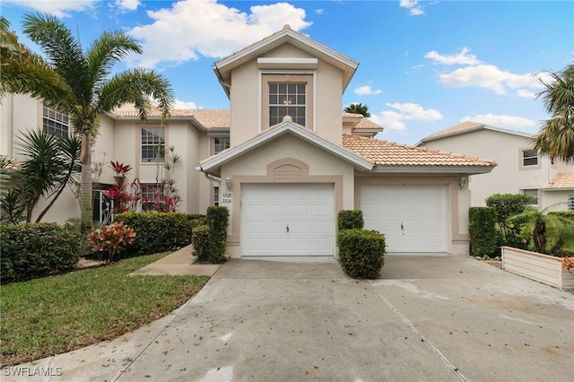 view of front of home with a garage