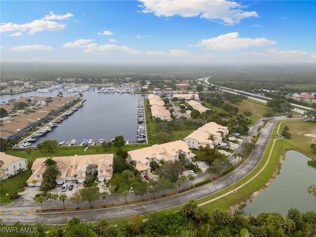 drone / aerial view featuring a water view