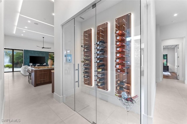 wine room with light tile patterned floors