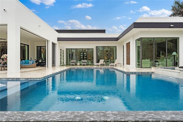 view of pool featuring a patio area