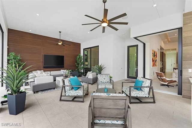 view of patio featuring outdoor lounge area and ceiling fan