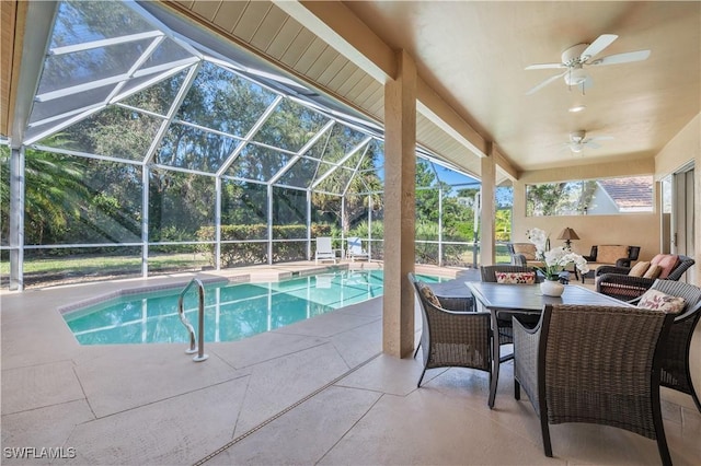 view of pool featuring ceiling fan, an outdoor living space, a lanai, and a patio