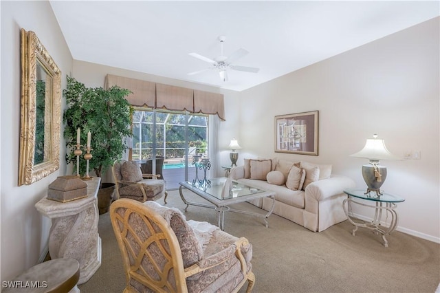 living room with carpet floors and ceiling fan