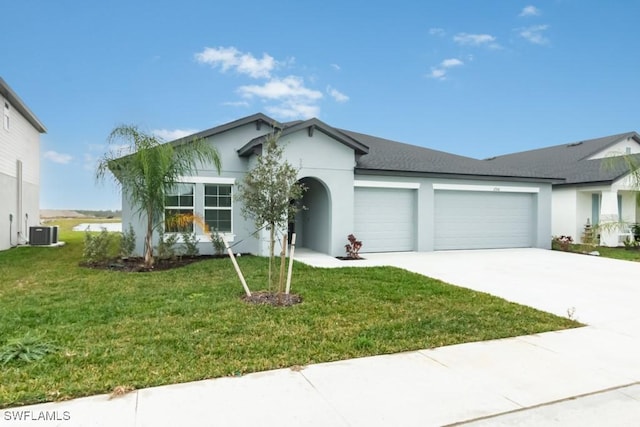 ranch-style house with central AC, a garage, and a front yard