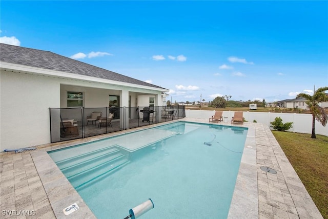 view of pool with a patio area