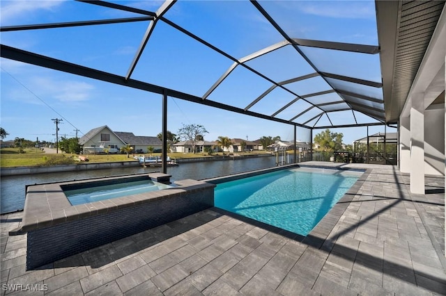 view of pool featuring a water view, an in ground hot tub, a lanai, and a patio