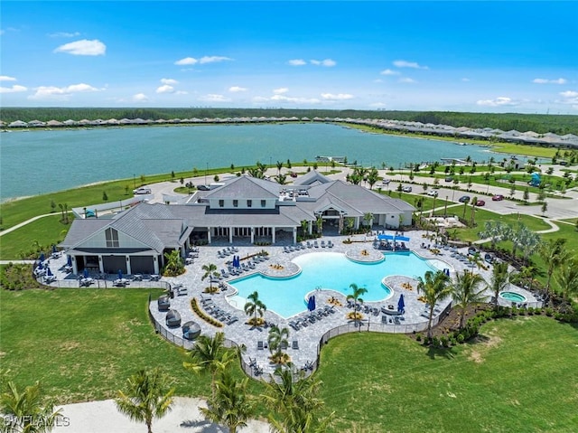 bird's eye view with a water view