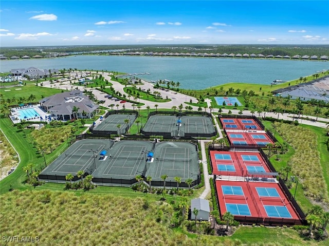 drone / aerial view with a water view