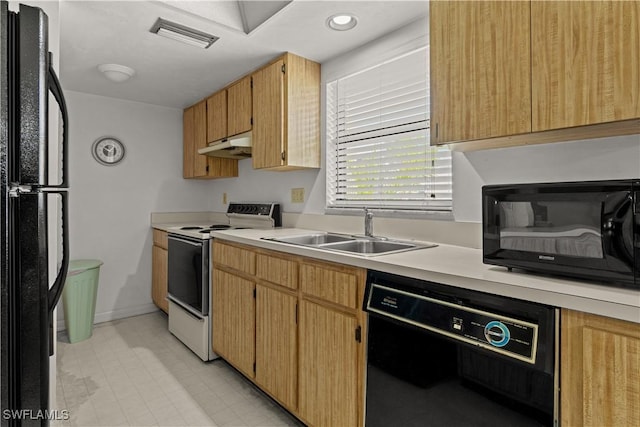 kitchen with sink and black appliances