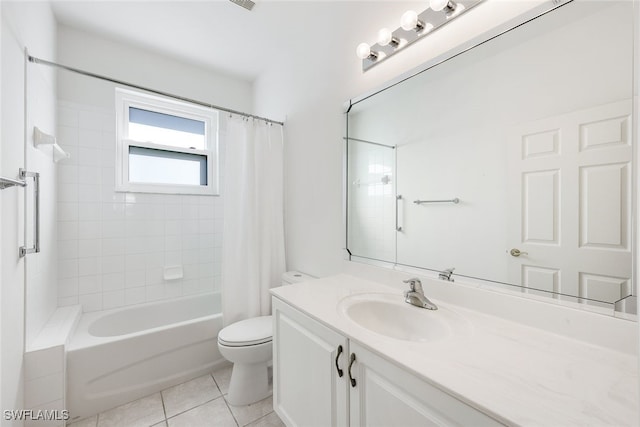 full bathroom with shower / bath combination with curtain, vanity, tile patterned floors, and toilet