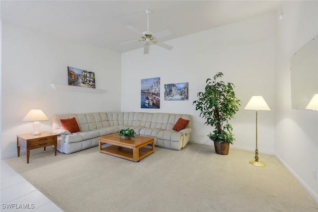 living room featuring carpet flooring and ceiling fan