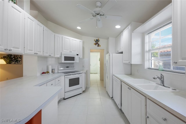 kitchen featuring sink, white appliances, ceiling fan, white cabinetry, and decorative backsplash