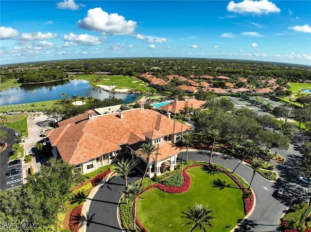 drone / aerial view with a water view