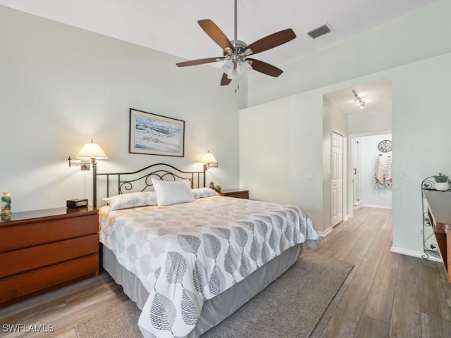 bedroom with wood-type flooring