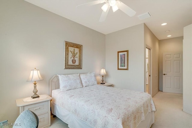 carpeted bedroom with ceiling fan