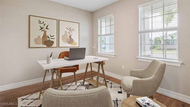 home office featuring wood finished floors and baseboards