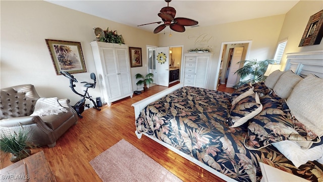 bedroom with ceiling fan, ensuite bath, and light hardwood / wood-style flooring