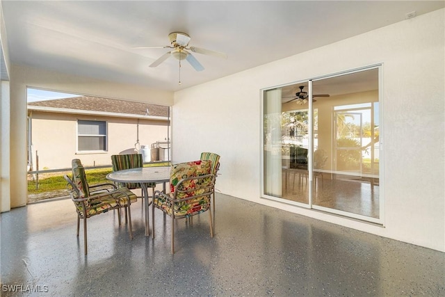 dining room with ceiling fan and a wealth of natural light