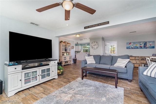 living room featuring ceiling fan