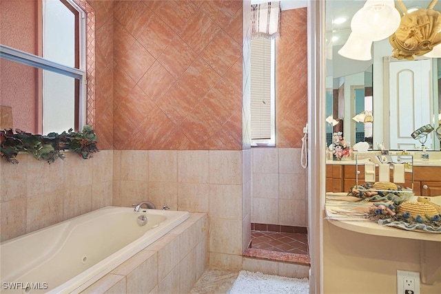 bathroom featuring vanity and plus walk in shower