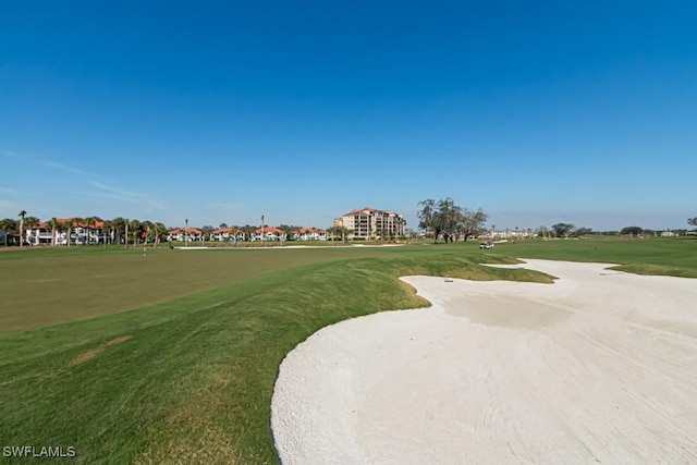 view of community featuring a lawn