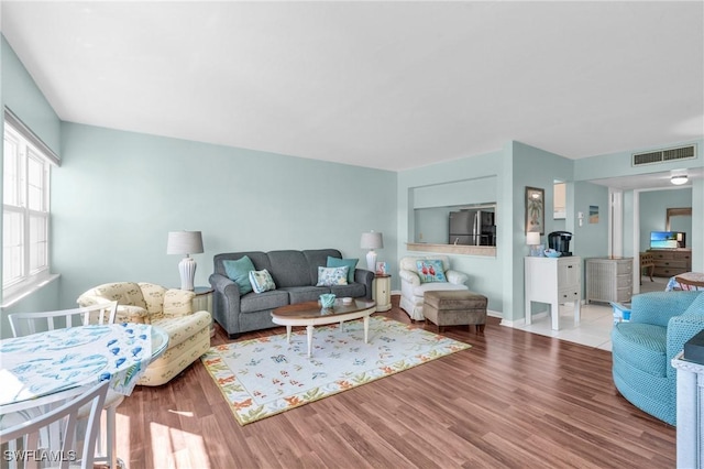 living room with hardwood / wood-style flooring