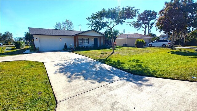 single story home featuring a garage and a front lawn