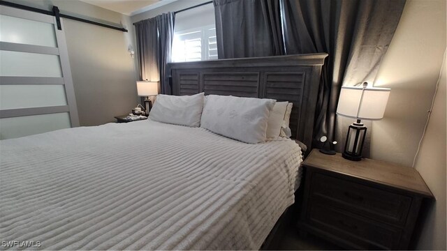 bedroom with a barn door