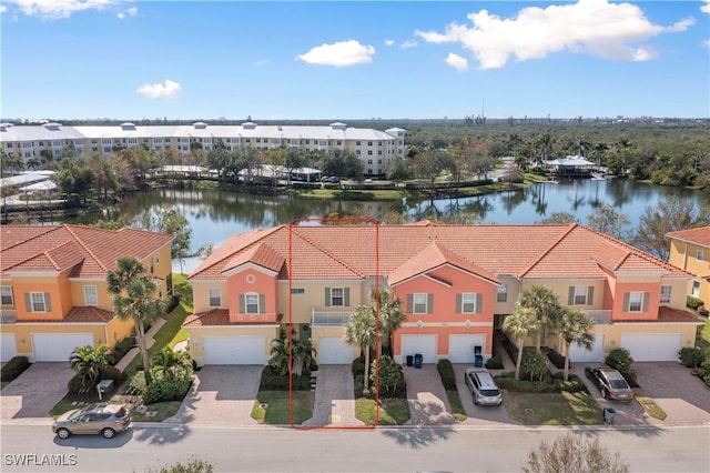 drone / aerial view featuring a water view