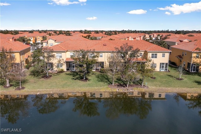 drone / aerial view with a water view