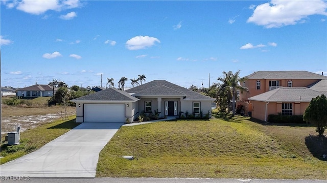 view of front facade featuring a garage and a front lawn