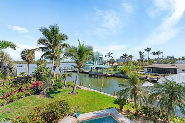 property view of water with a dock