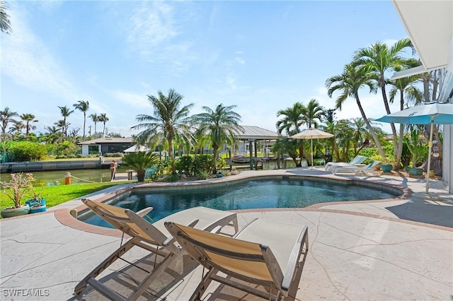 pool with a patio area