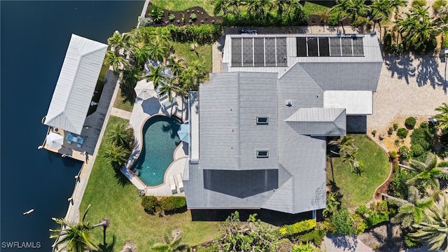 bird's eye view with a water view