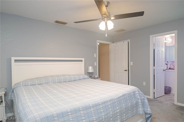 carpeted bedroom with ceiling fan