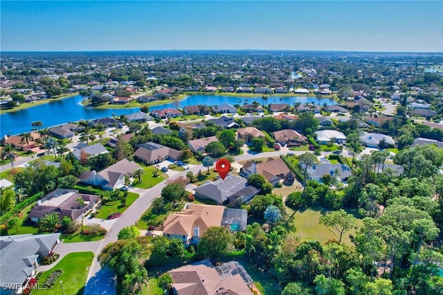 drone / aerial view with a water view