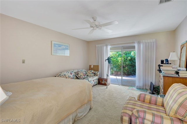 bedroom featuring ceiling fan, light colored carpet, and access to outside