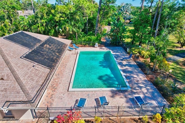 view of swimming pool with a patio area