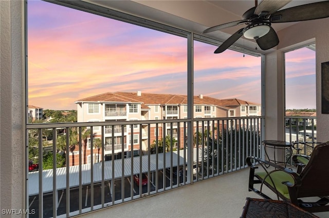 balcony at dusk with ceiling fan