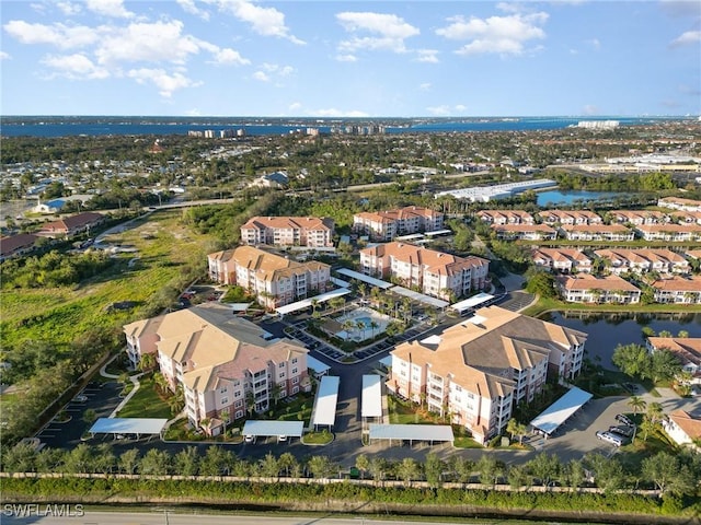 drone / aerial view with a water view