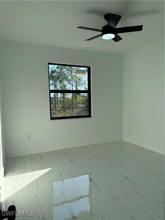 empty room featuring ceiling fan