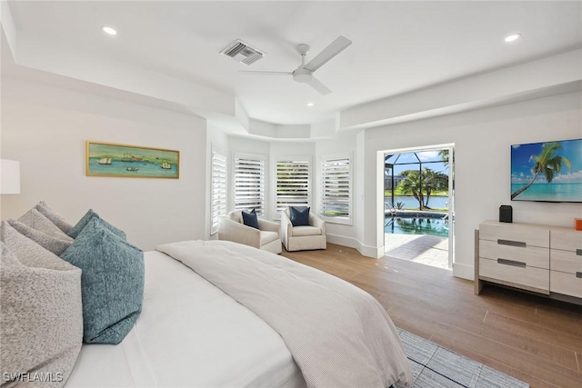 bedroom featuring recessed lighting, access to outside, visible vents, and light wood finished floors